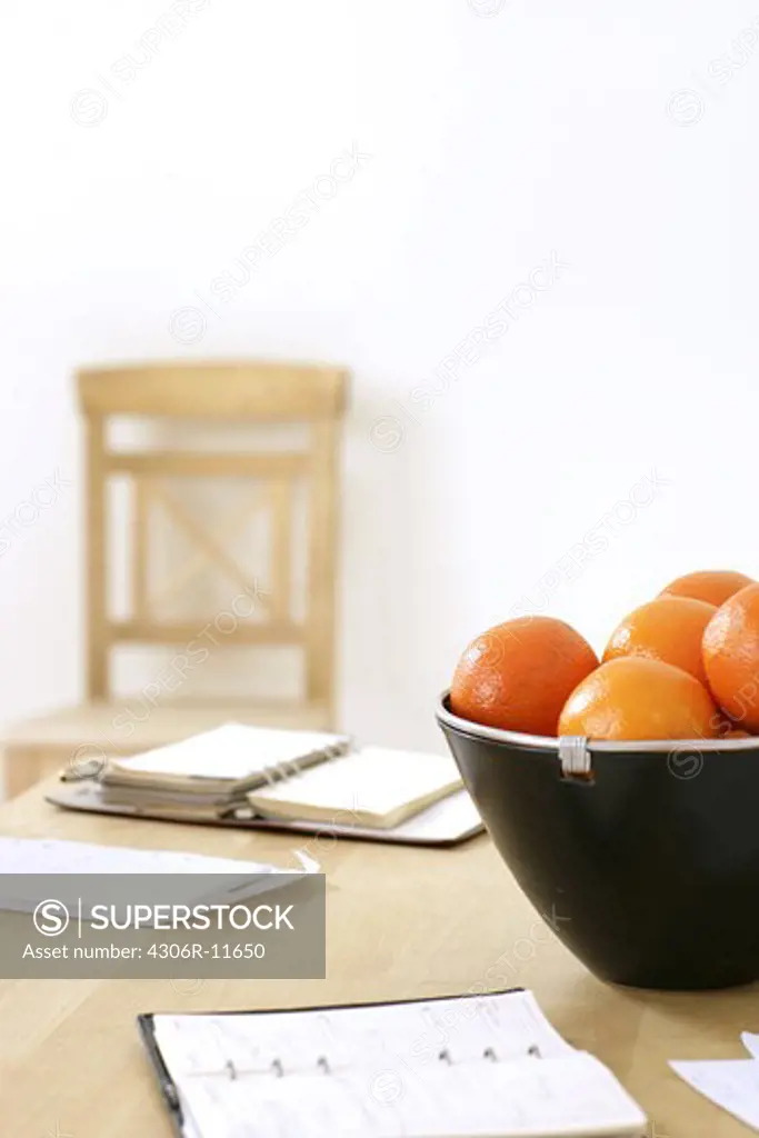 Two calendars and a bowl of oranges, Sweden.