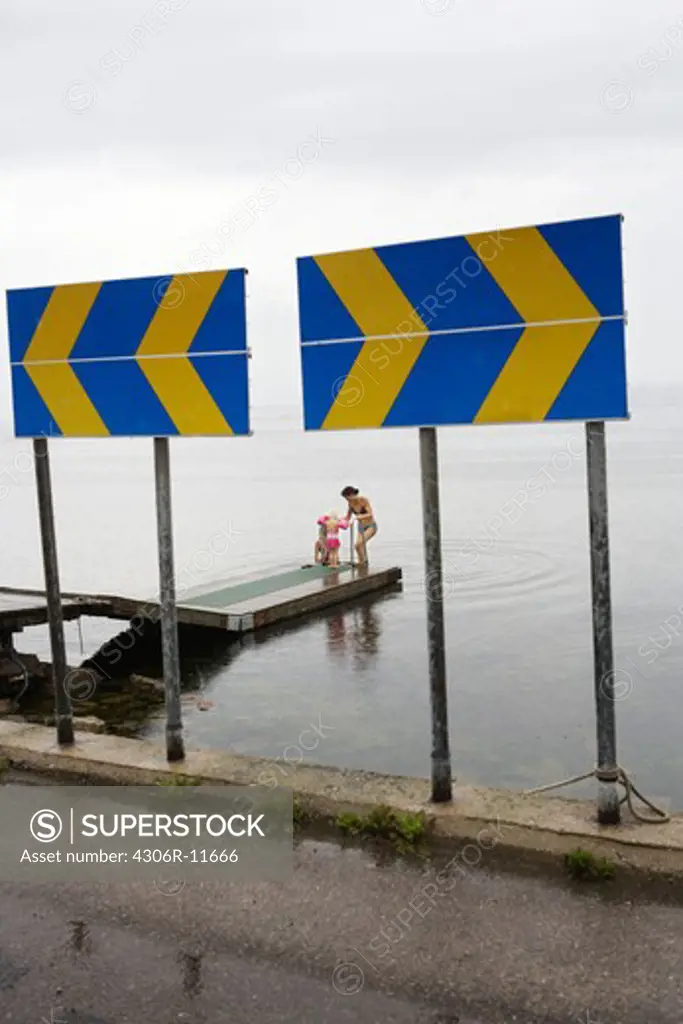 A mother and her daughter going for a swim, Oland, Sweden.