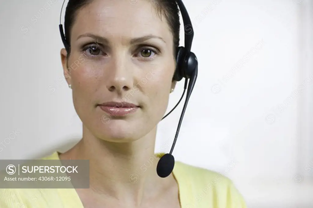 A woman with a headset.