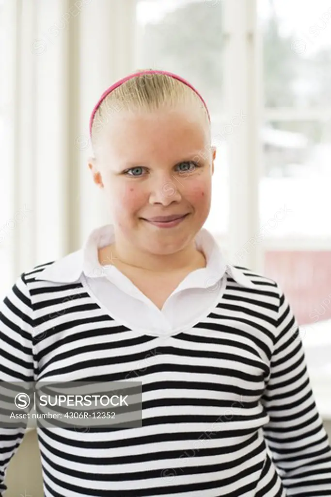 Portrait of a smiling girl, Sweden.
