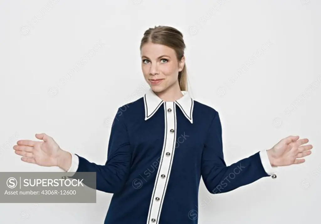 A Scandinavian woman pointing out the direction.