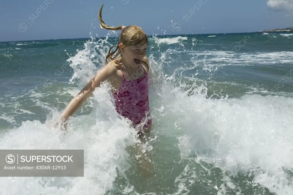 A Scandinavian girl bathing in the sea, Greece.