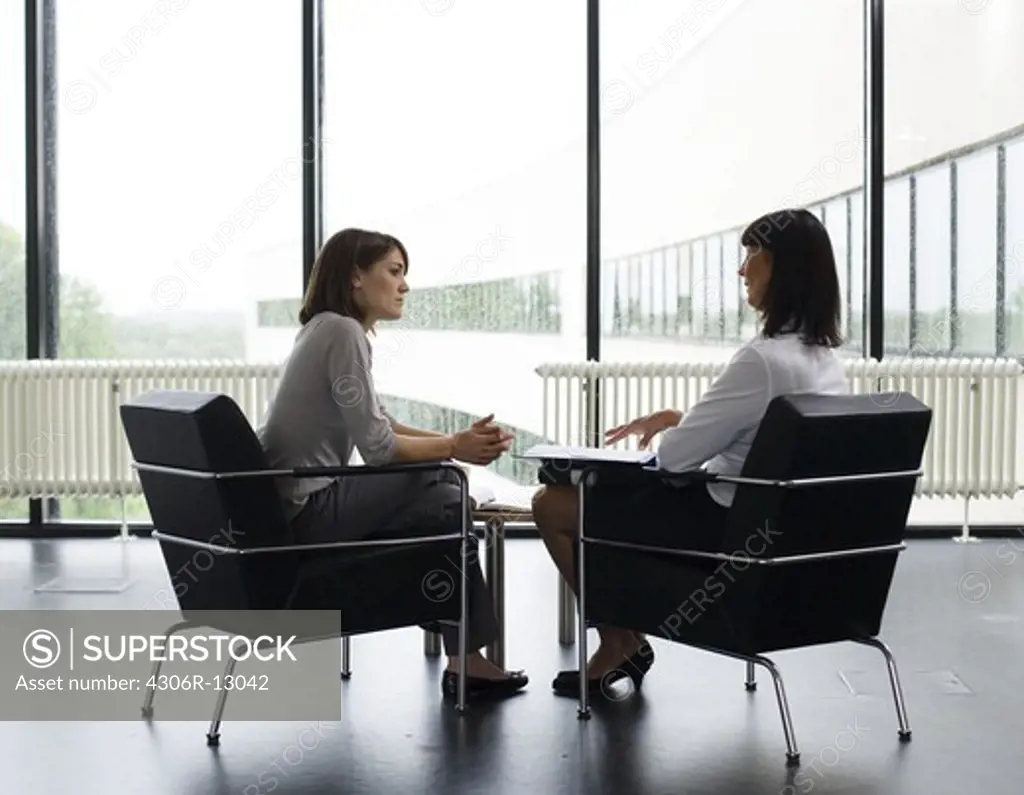 Women sitting in an office, Sweden.