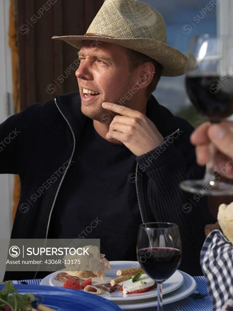 A Scandinavian man wearing a hat.