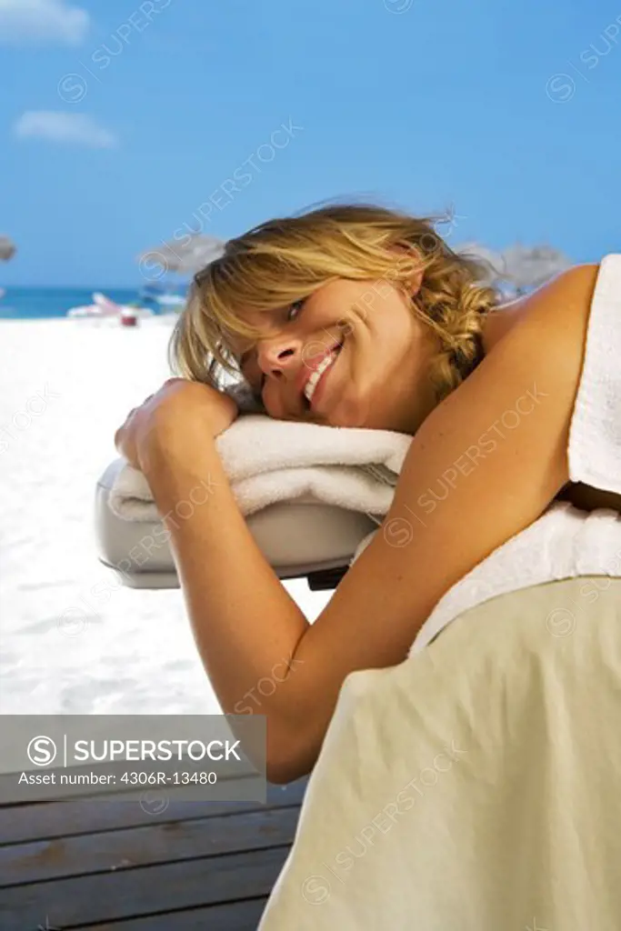 A woman in a spa on a beach, Aruba.