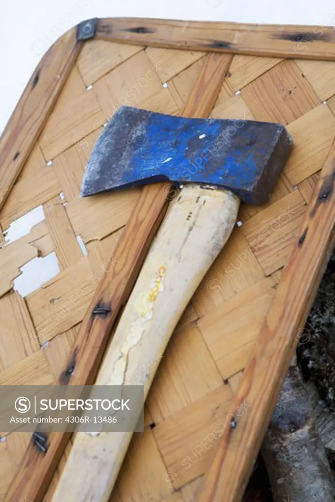An axe and woods, Sweden.