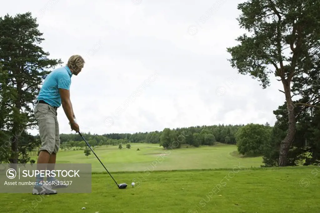 A man playing golf, Sweden.