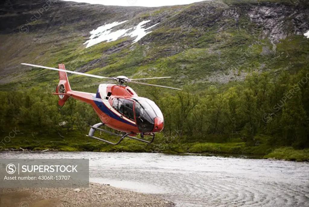 A helicopter in the mountains, Sweden.