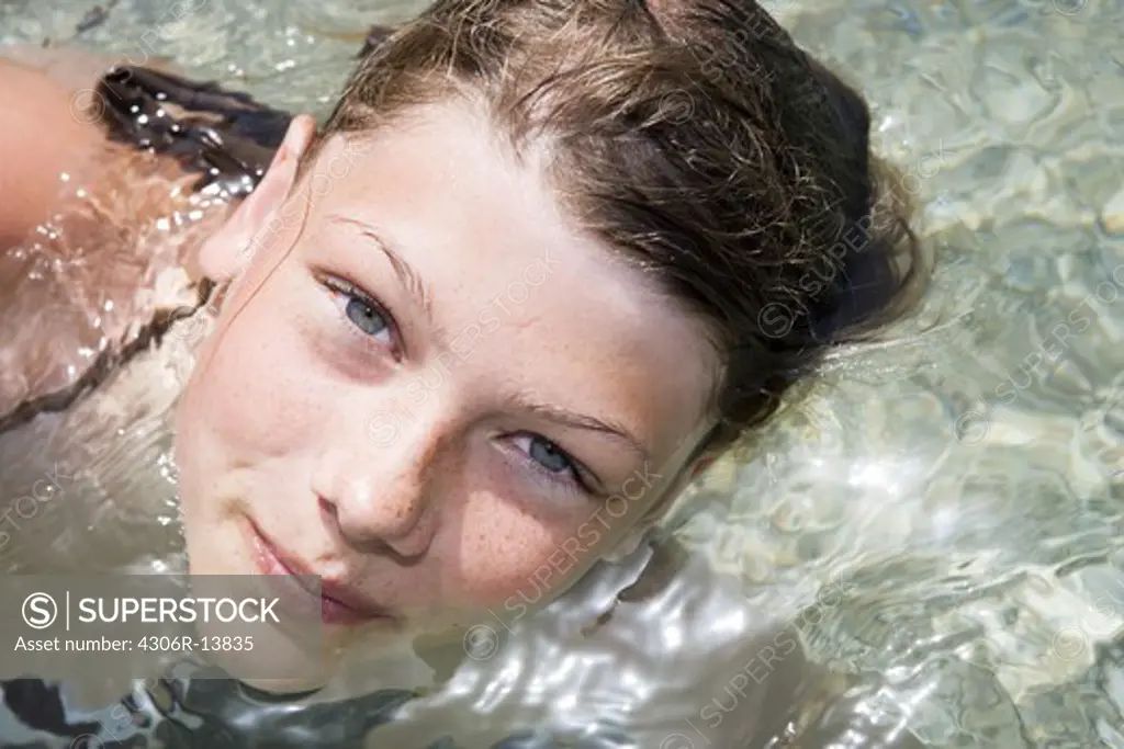 Portrait of a Scandinavian girl in the water, Greece.