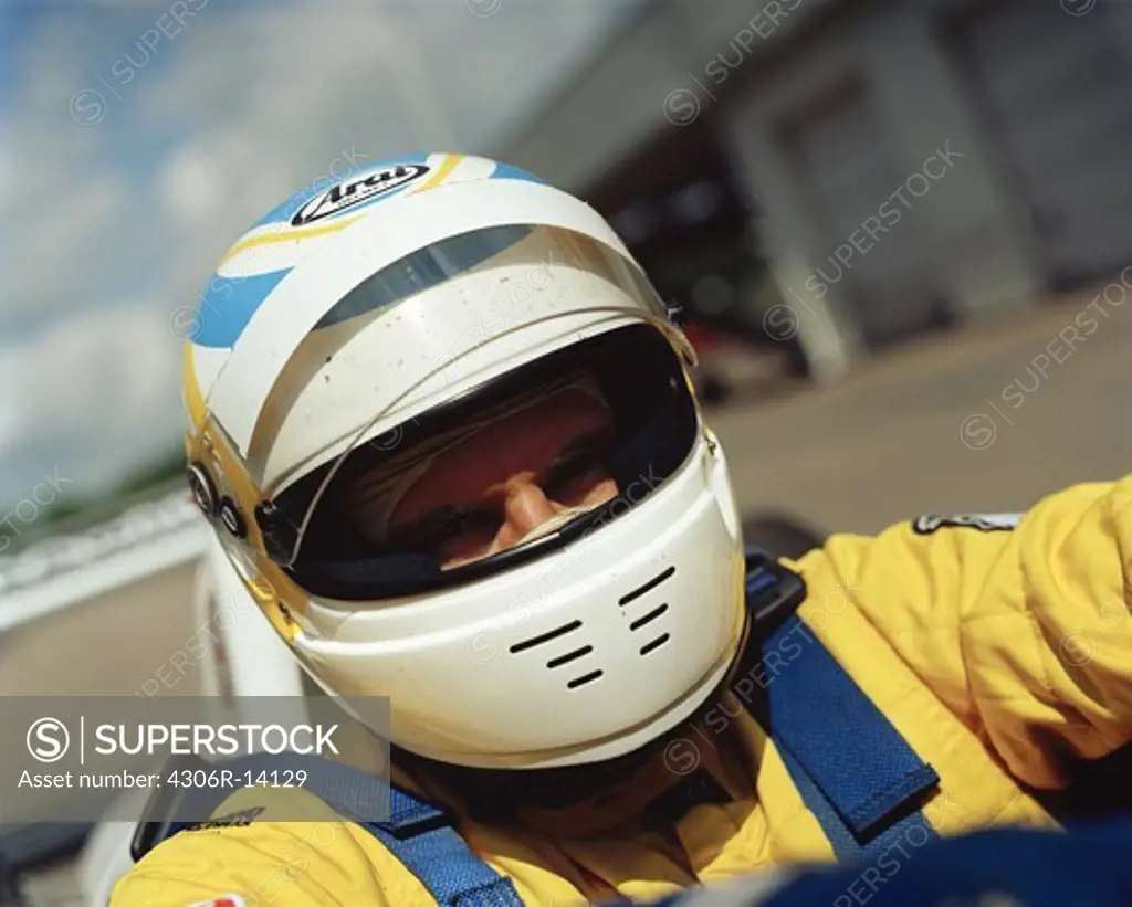 A driver in a racing var, close-up, Astorp, Sweden.