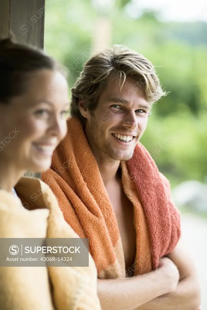 Two people with towels, Sweden.