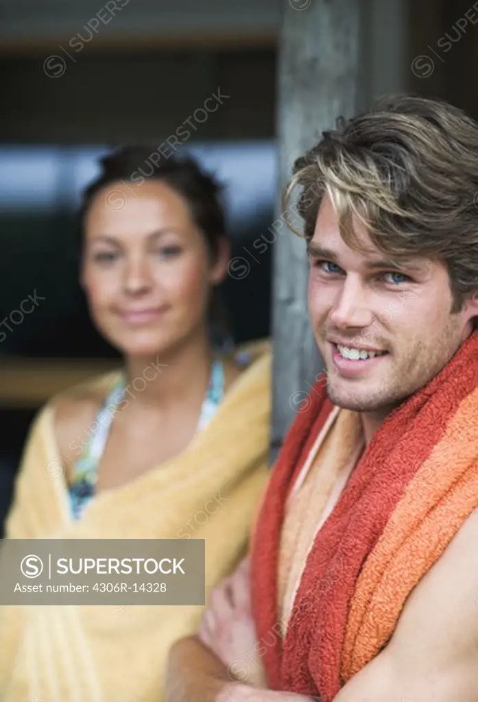 Two people with towels, Sweden.