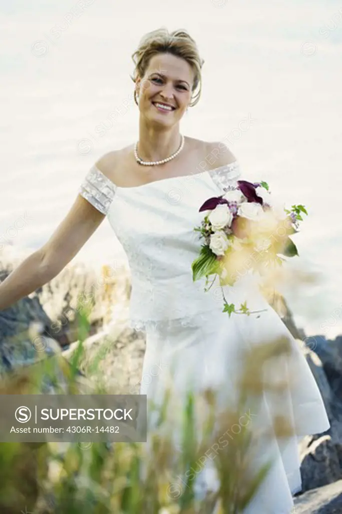 A bride with wedding bouquet, Sweden.
