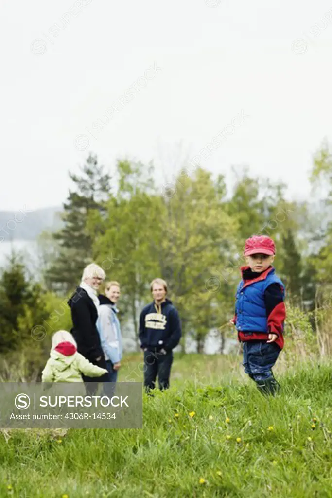 Children and adults outdoors, Sweden.