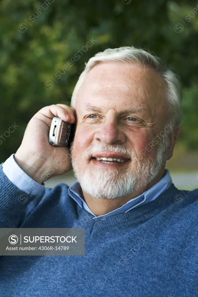 A man talking in a mobile phone, Sweden.