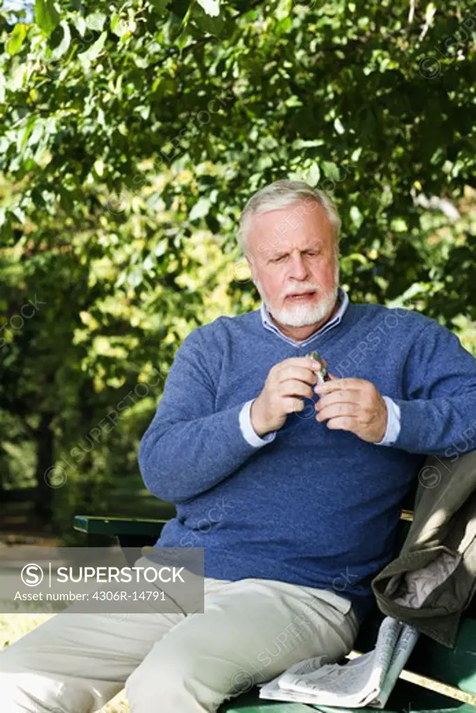 A man sitting in a park.