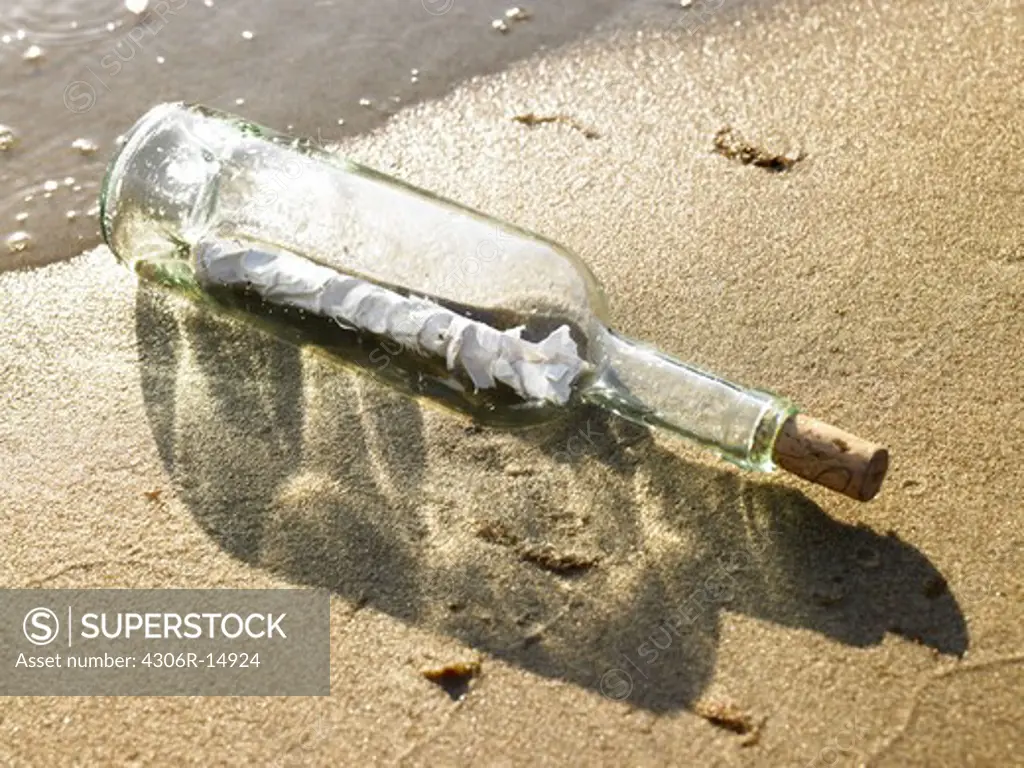 Message enclosed in a bottle thrown into the sea, Denmark.
