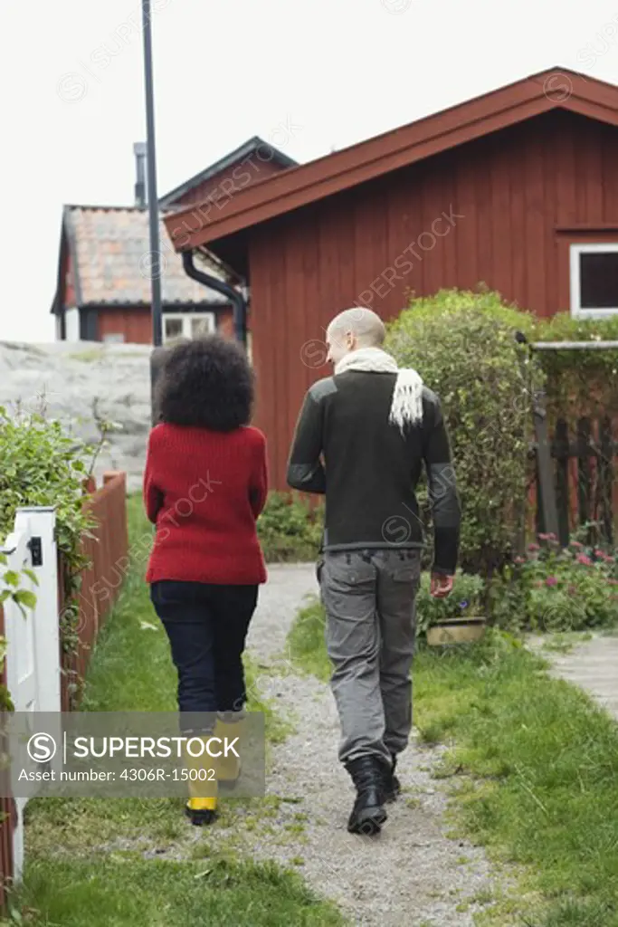 A couple walking, Sweden.
