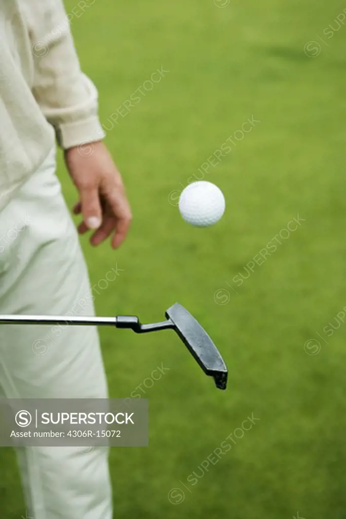 A man playing golf, Sweden.