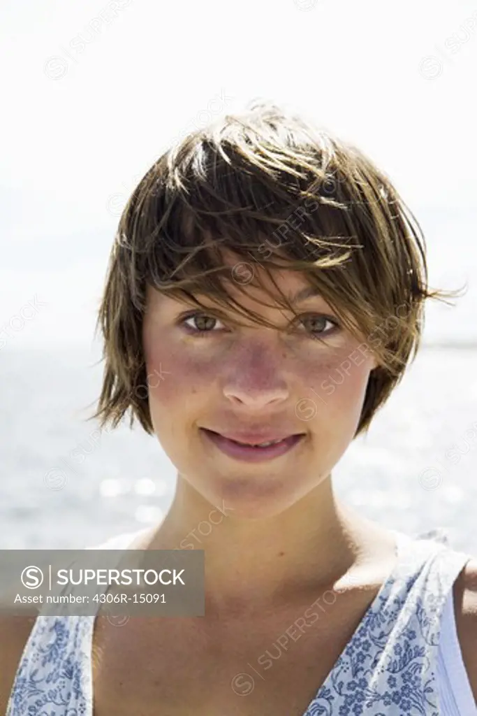 A smiling scandinavian woman in the archipelago, Sweden.