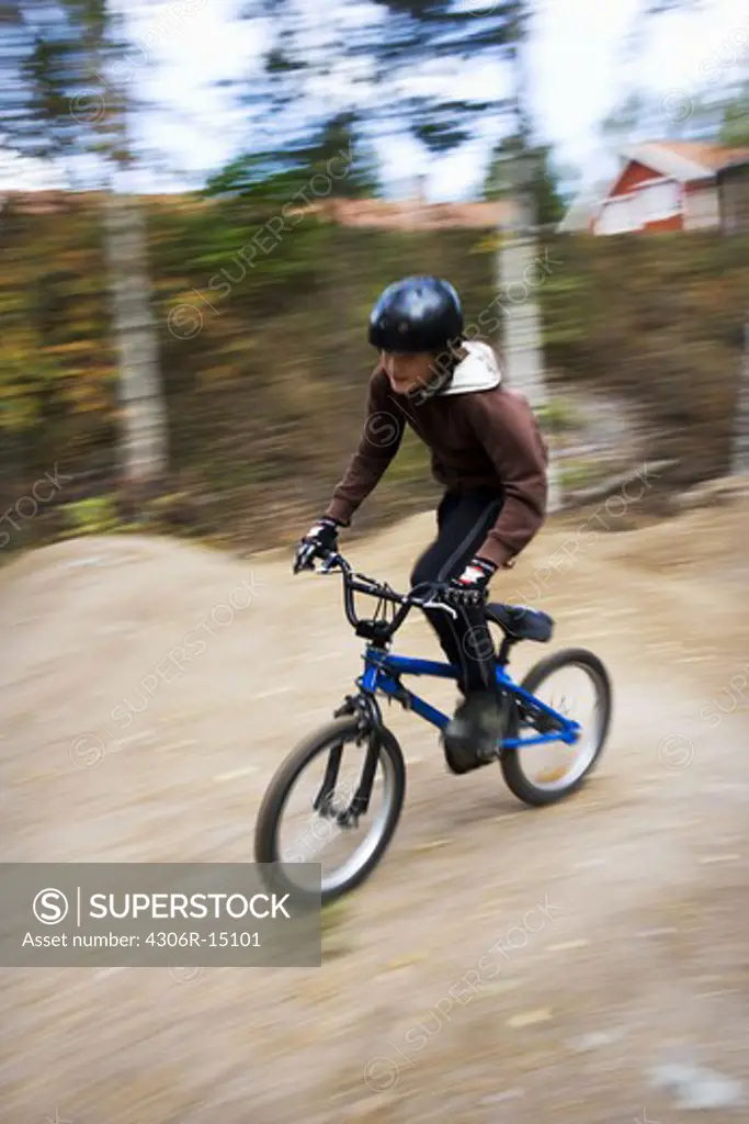 A boy on a BMX bicycle, Sweden.