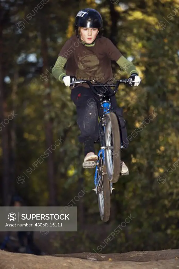 A boy on a BMX bicycle, Sweden.