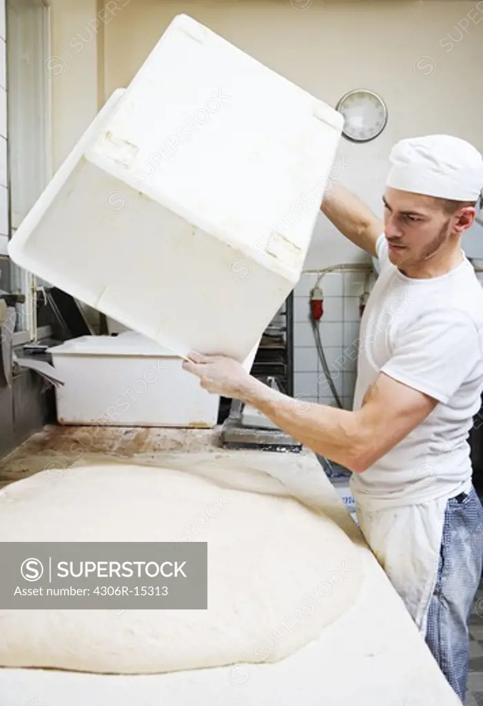 A baker in a bakery, Sweden.