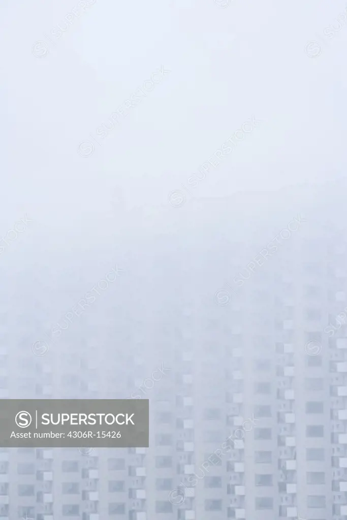 High-rise block in haze, Sweden.