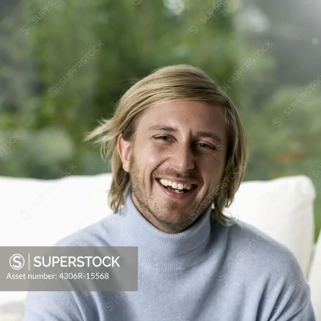 Portrait of a young smiling man, Sweden.