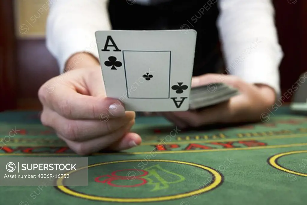 A croupier at a gambling table.