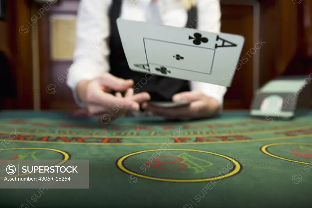 A croupier at a gambling table.