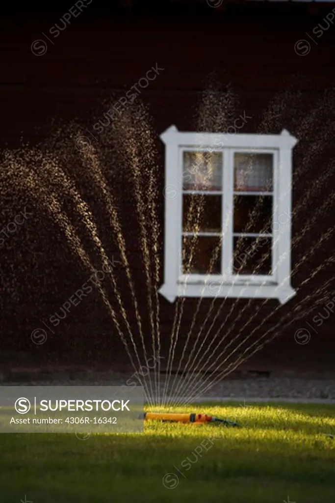 A water sprinkler on a lawn, Sweden.