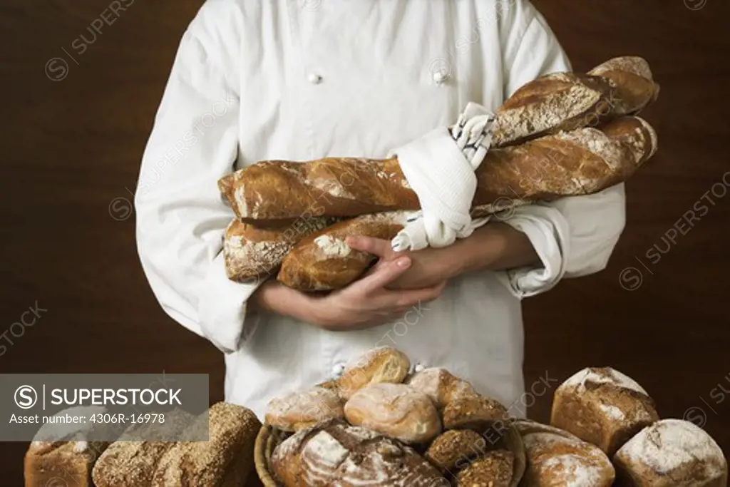 A baker and bread, Sweden.