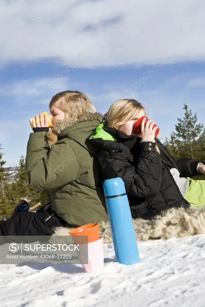 Two girls on ski vacation, Sweden.