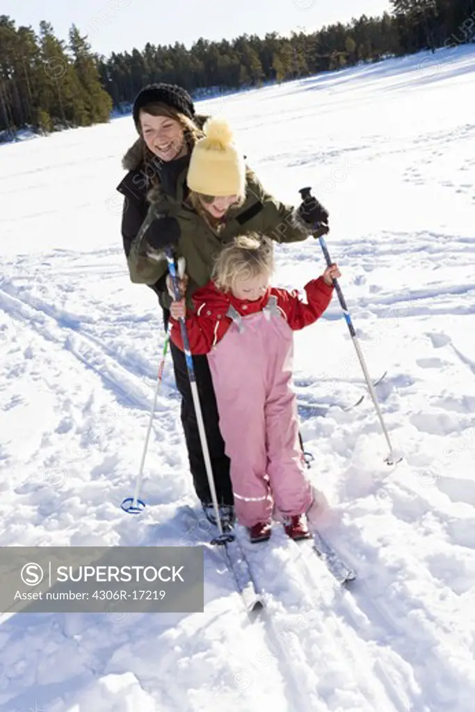 Sisters skiing, Sweden.