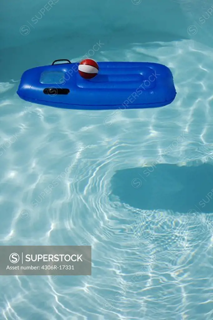 Air mattress in a swimming-pool, the Canary Islands.