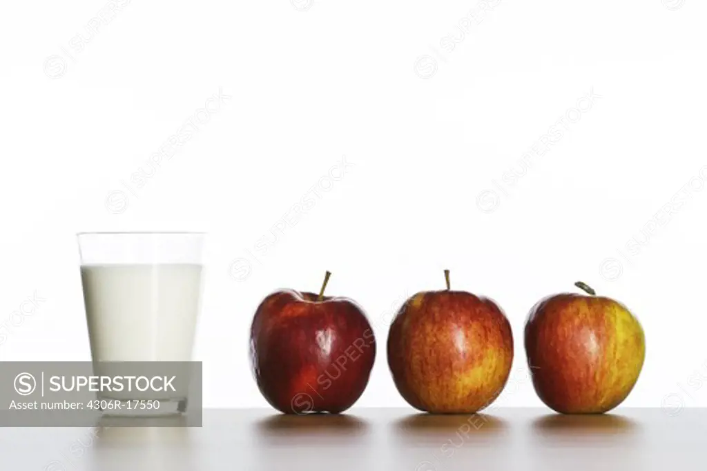 Apple and a glass of milk.