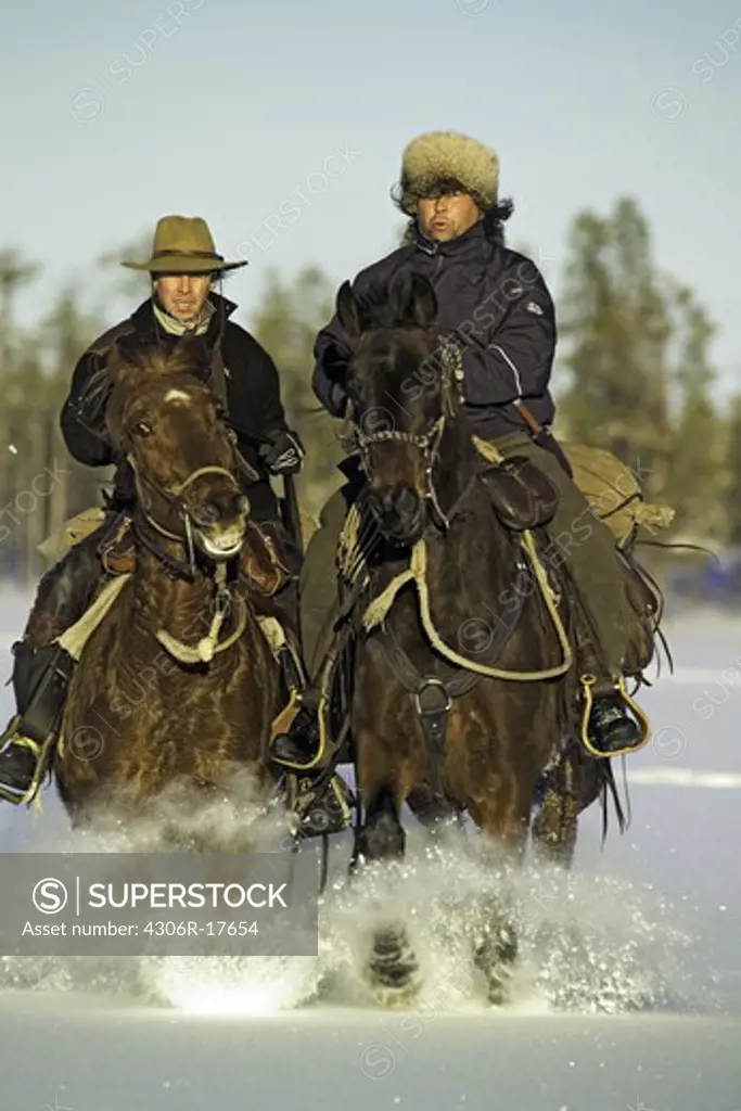 Horseback riding in the snow, Sweden.