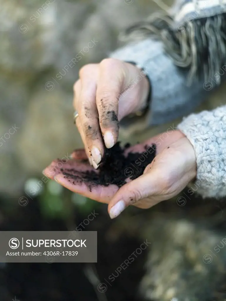 Earth in the hands of a woman, Sweden.