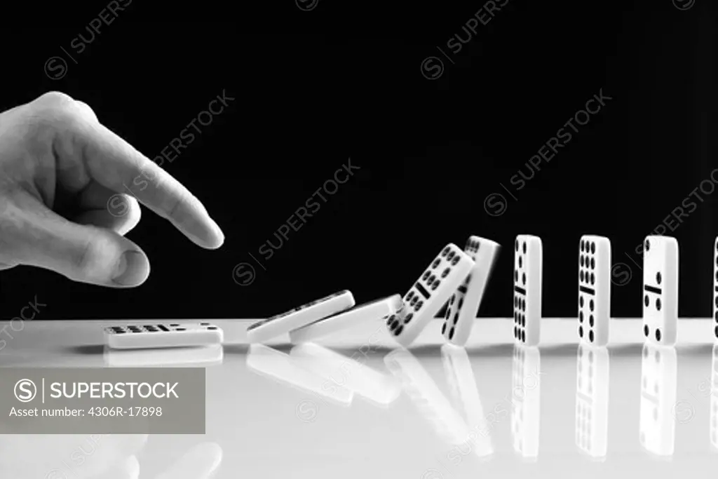 Row of Domino Tiles falling.