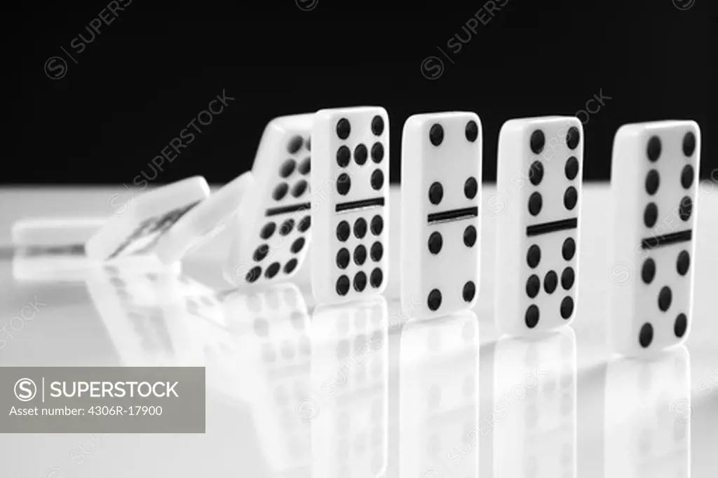 Row of Domino Tiles falling.