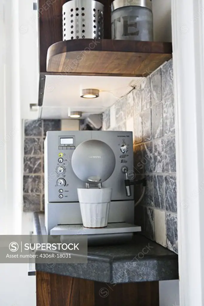 An espresso machine in a kitchen, Sweden.
