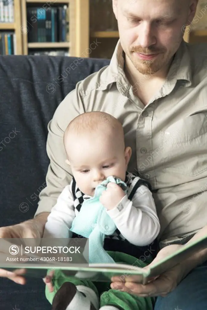 Father reading for his son.