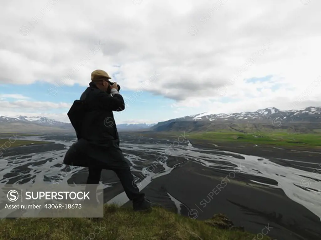 A photographer taking pictures, Iceland.