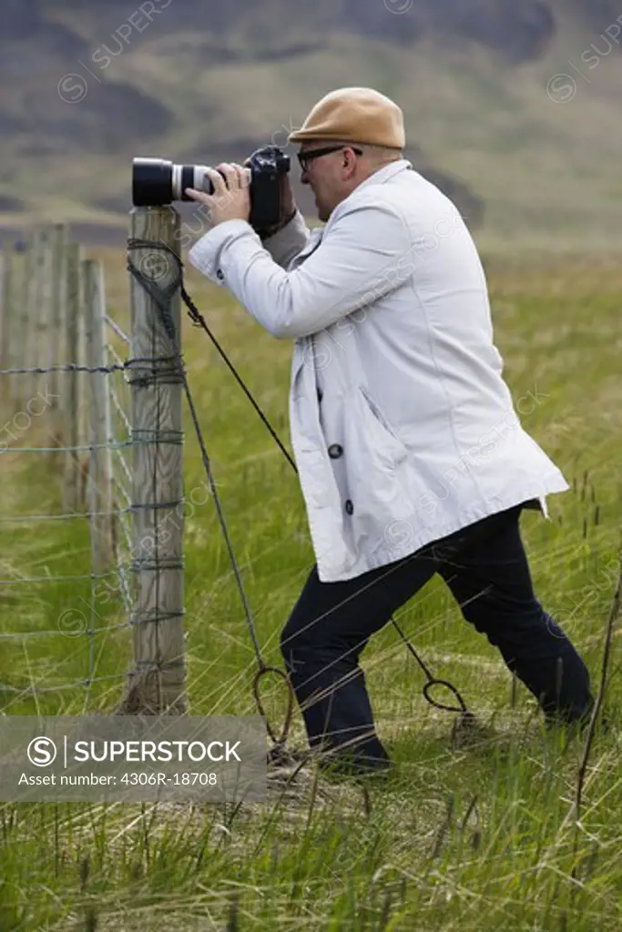 A man taking pictures, Iceland.