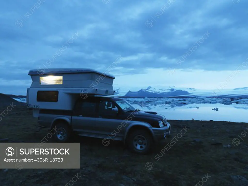 Camper by night, Jokulsrln, Vatnajokull, Iceland.