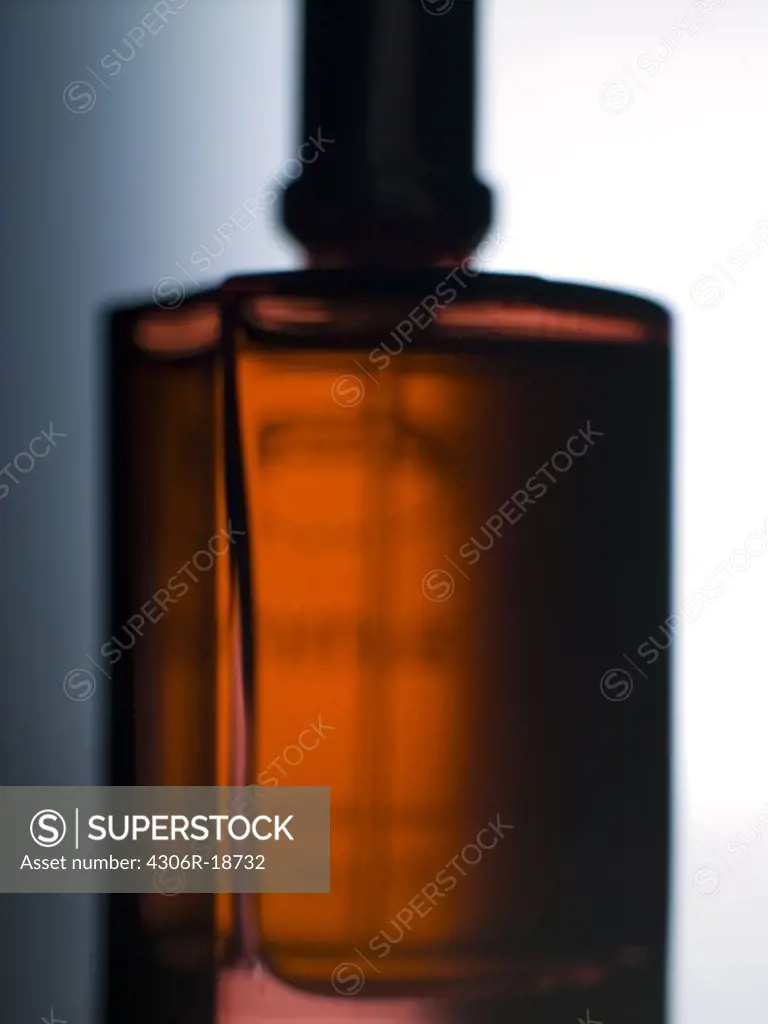 Bottle of perfume, close-up.