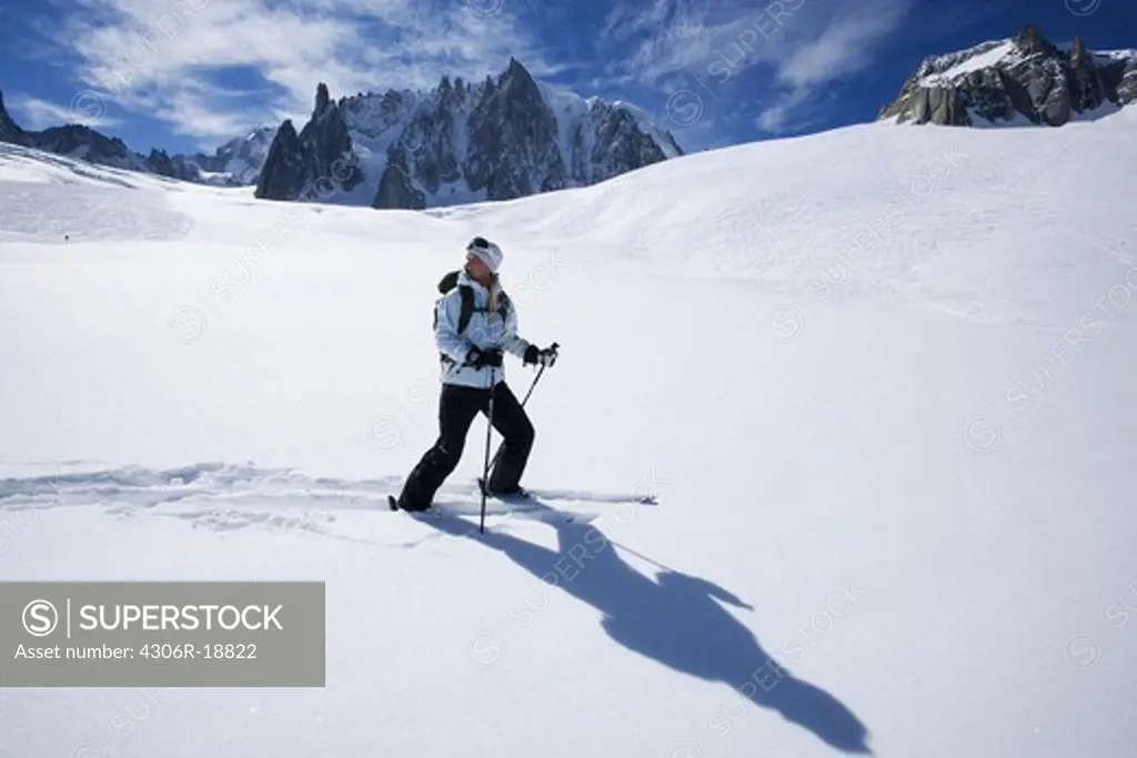 Skier going downhill, Chamonix, France.