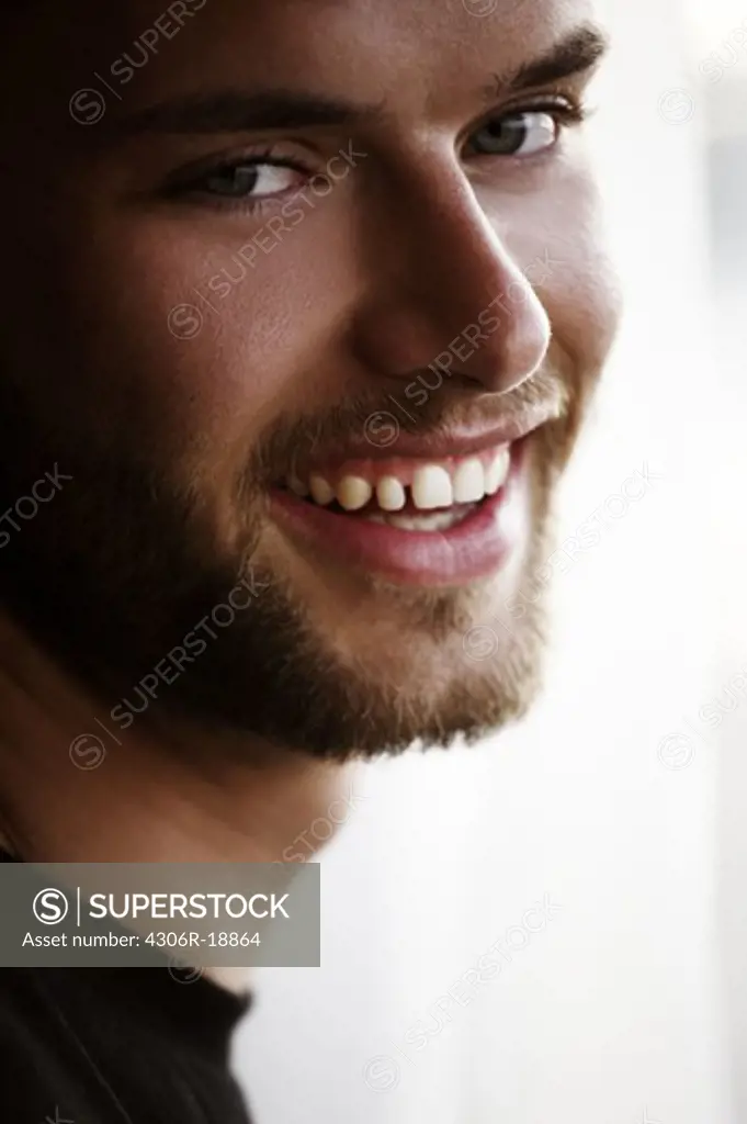 A laughing man, close-up.