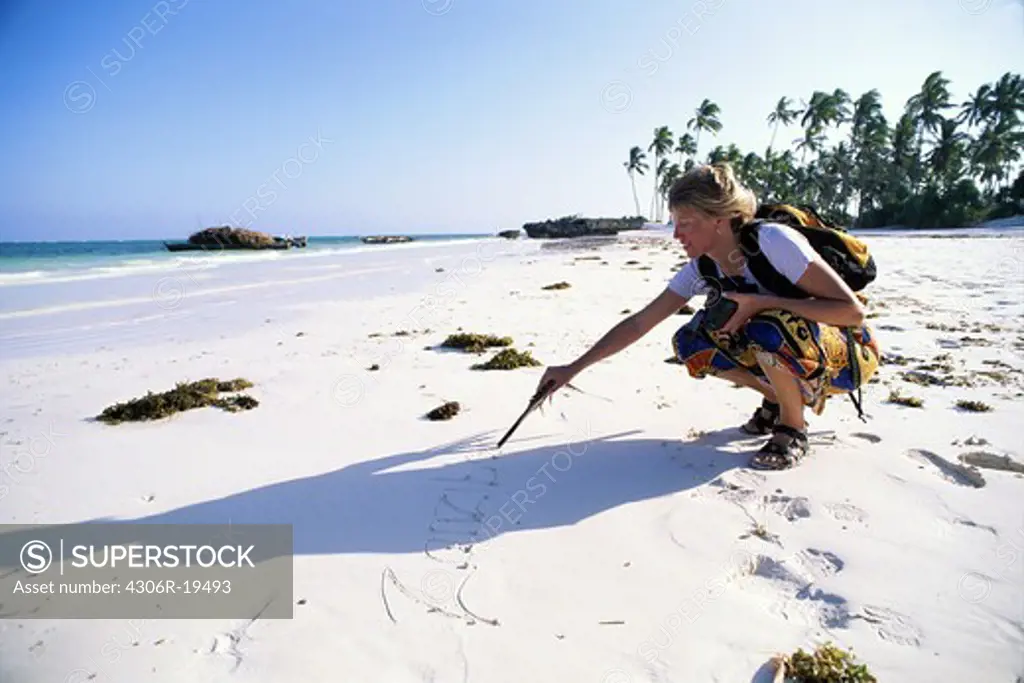 A woman on a beach, Zanzibar.